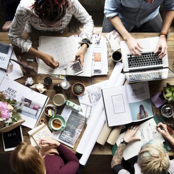 Colleagues working at a desk